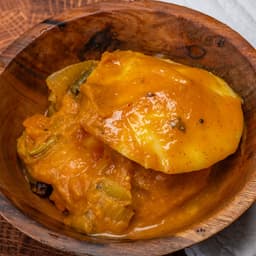 Idli Dipped in Sambhar 2 Pc